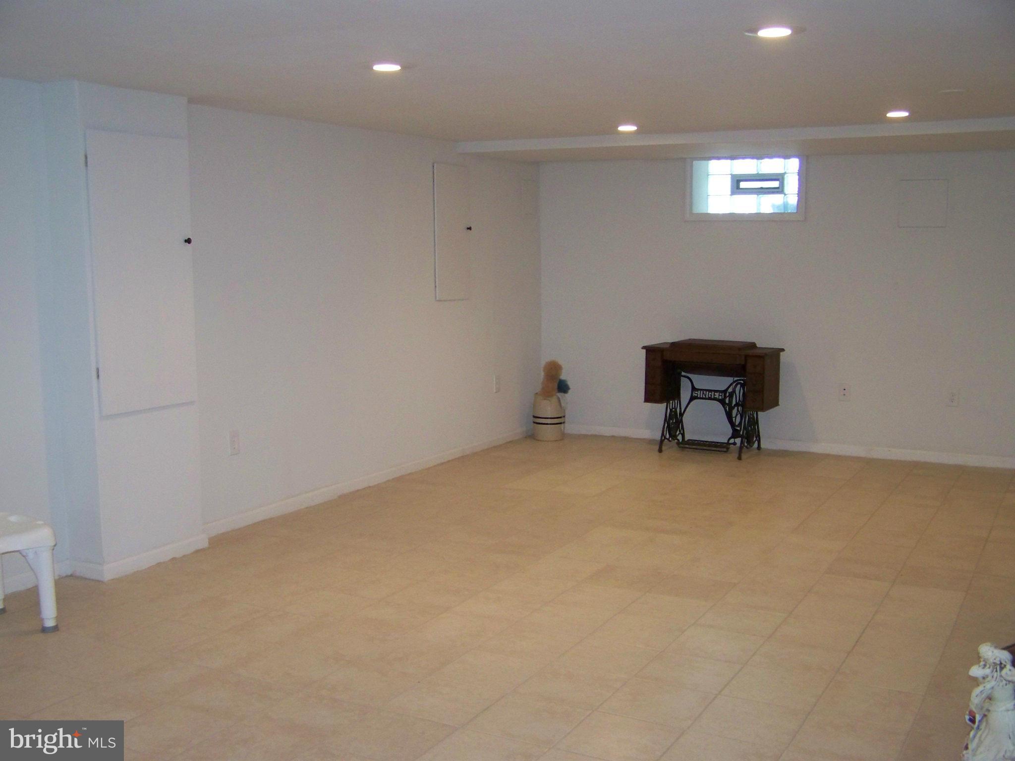 6225 Golden Ring Road Rosedale, MD 21237 - Photo 4 of 17 Huge waterproofed new rec room