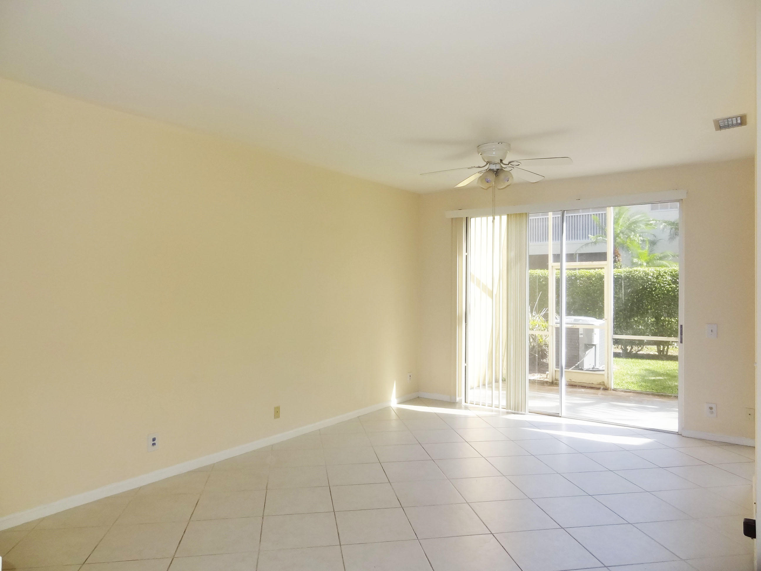 6704 Via Regina Boca Raton, FL 33433 - Photo 10 of 20 FAMILY ROOM OVERLOOKING PATIO