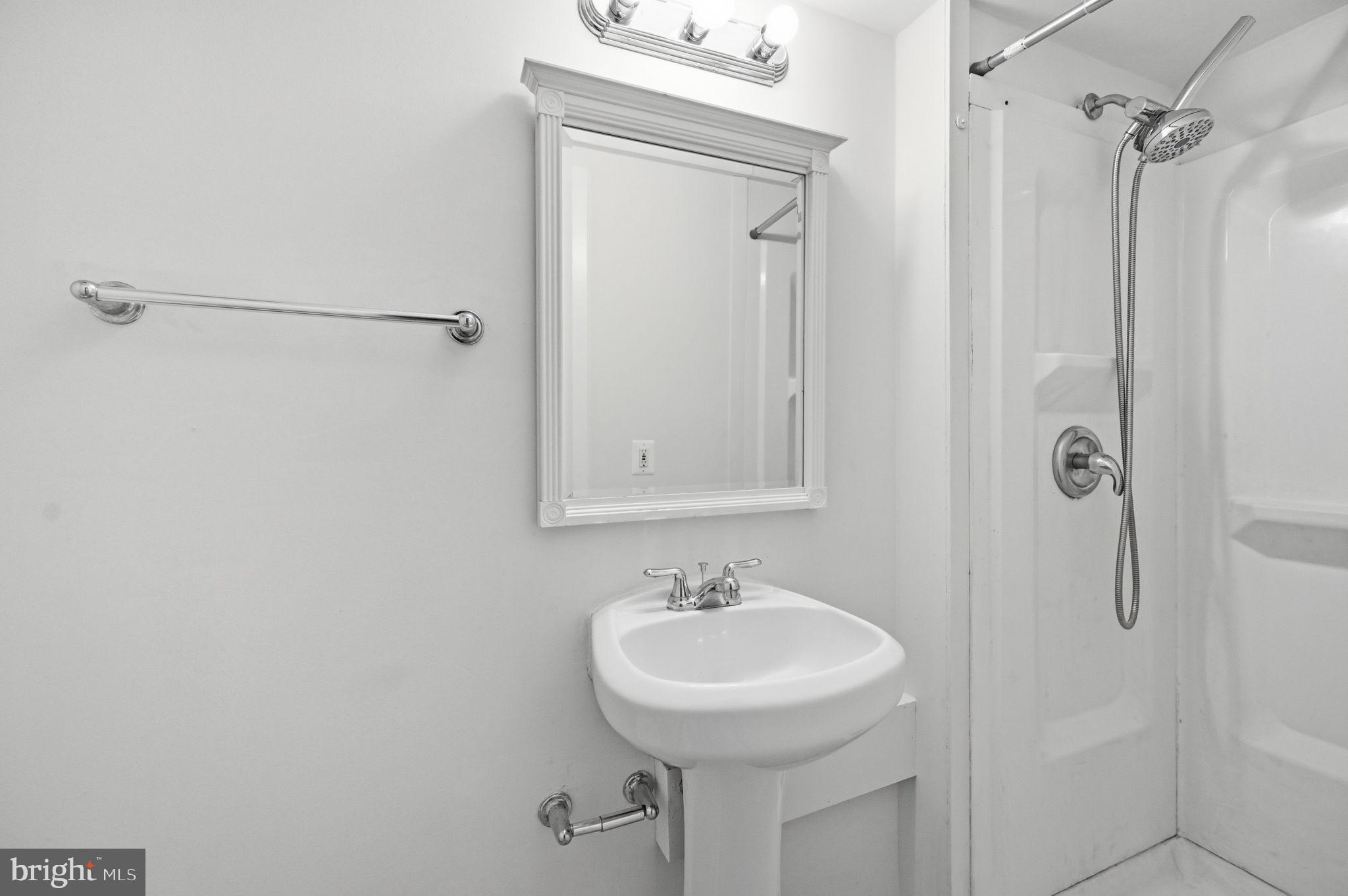 2908 Jermantown Road, Unit 24 Oakton, VA 22124 - Photo 54 of 74 Sleek and modern bathroom oasis.