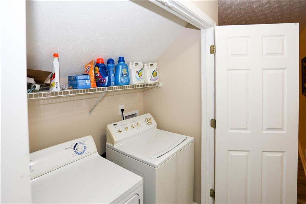 661 Michael Circle Monroe, GA 30655 - Photo 17 of 20 a utility room with dryer and washer