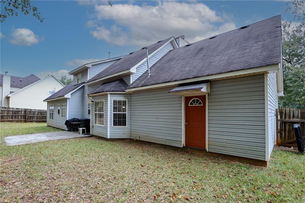 661 Michael Circle Monroe, GA 30655 - Photo 20 of 20 a view of a house with a yard