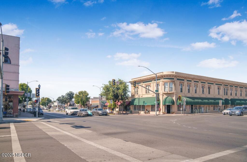 1200 East Walnut Avenue, Unit A Lompoc, CA 93436 - Photo 22 of 23 a view of a building with a street