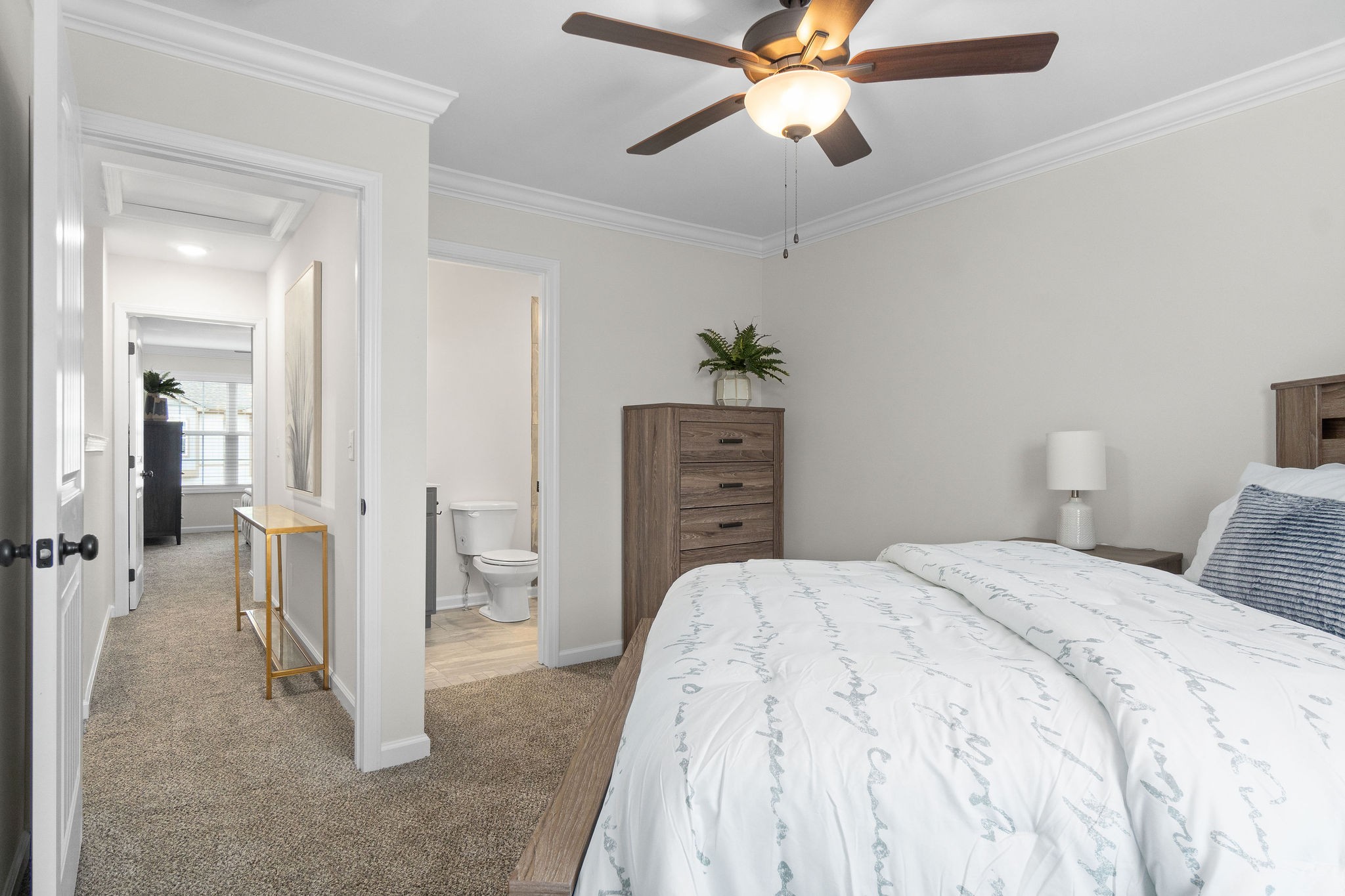 3350 Allen Road, Unit 18 Clarksville, TN 37042 - Photo 23 of 28 a spacious bedroom with a bed and a chandelier