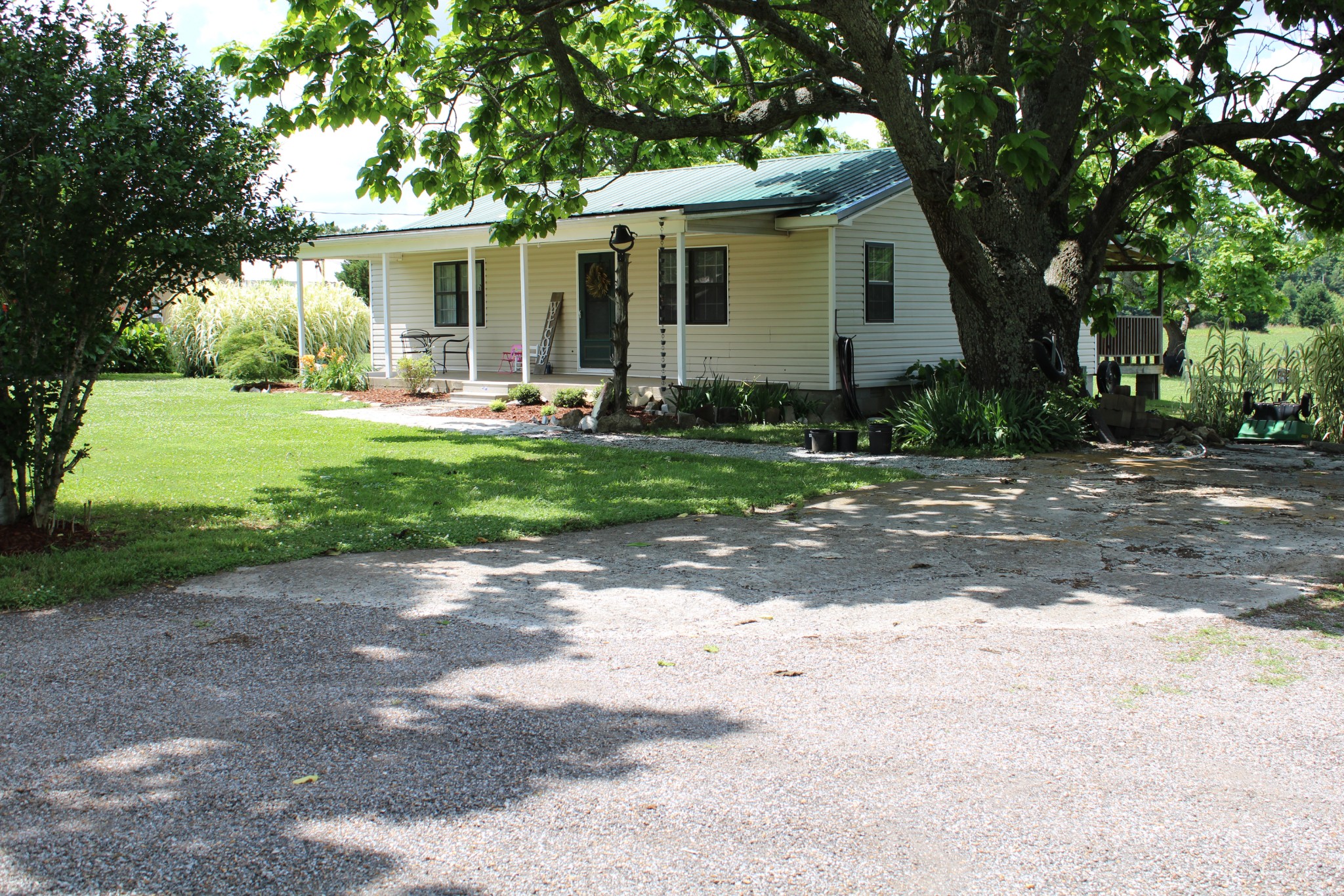 25677 Bethel Road Elkmont, AL 35620 - Photo 2 of 28 a front view of house with yard and green space