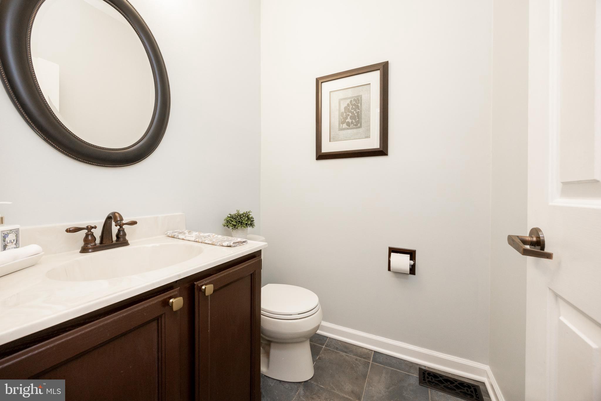 211 Ravenwood Road Exton, PA 19341 - Photo 14 of 44 Powder Room off Kitchen adjacent to Laundry