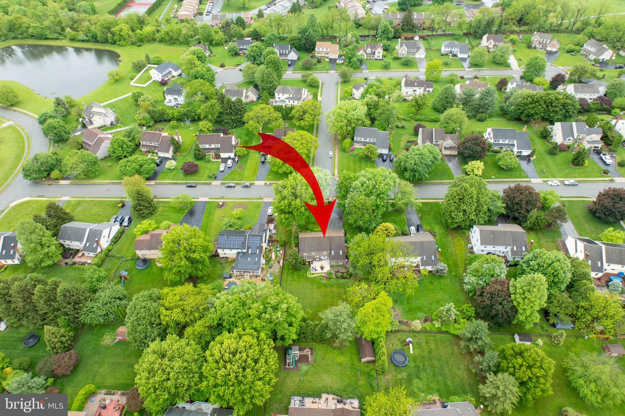 211 Ravenwood Road Exton, PA 19341 - Photo 28 of 44 Aerial view over Neighborhood taking in the Pond