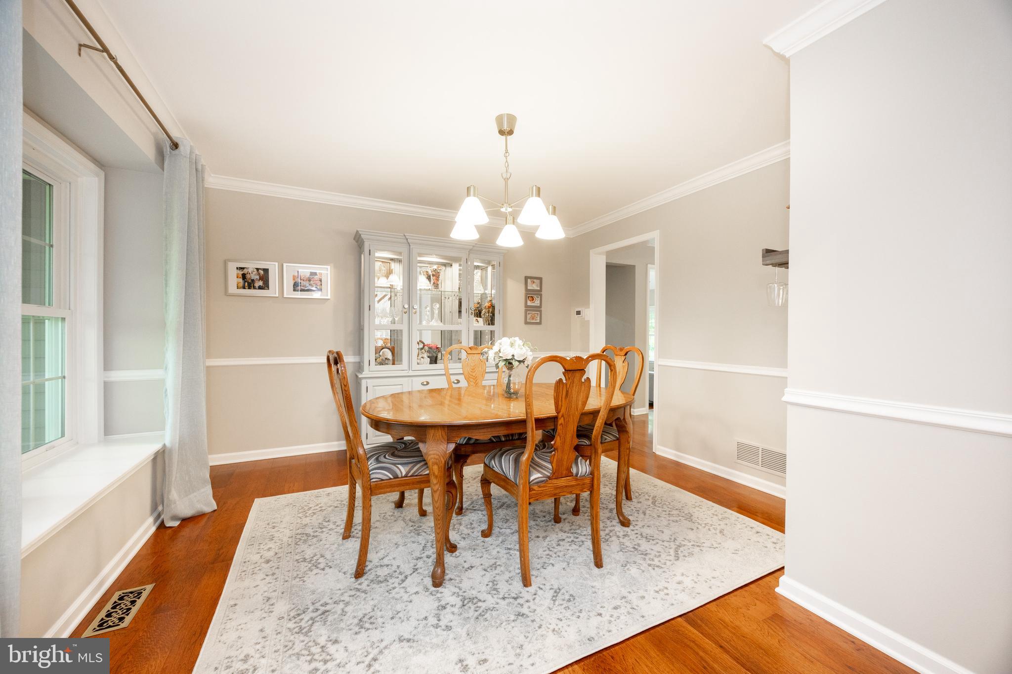 211 Ravenwood Road Exton, PA 19341 - Photo 30 of 44 Great flow from hall thru Dining Room to Kitchen