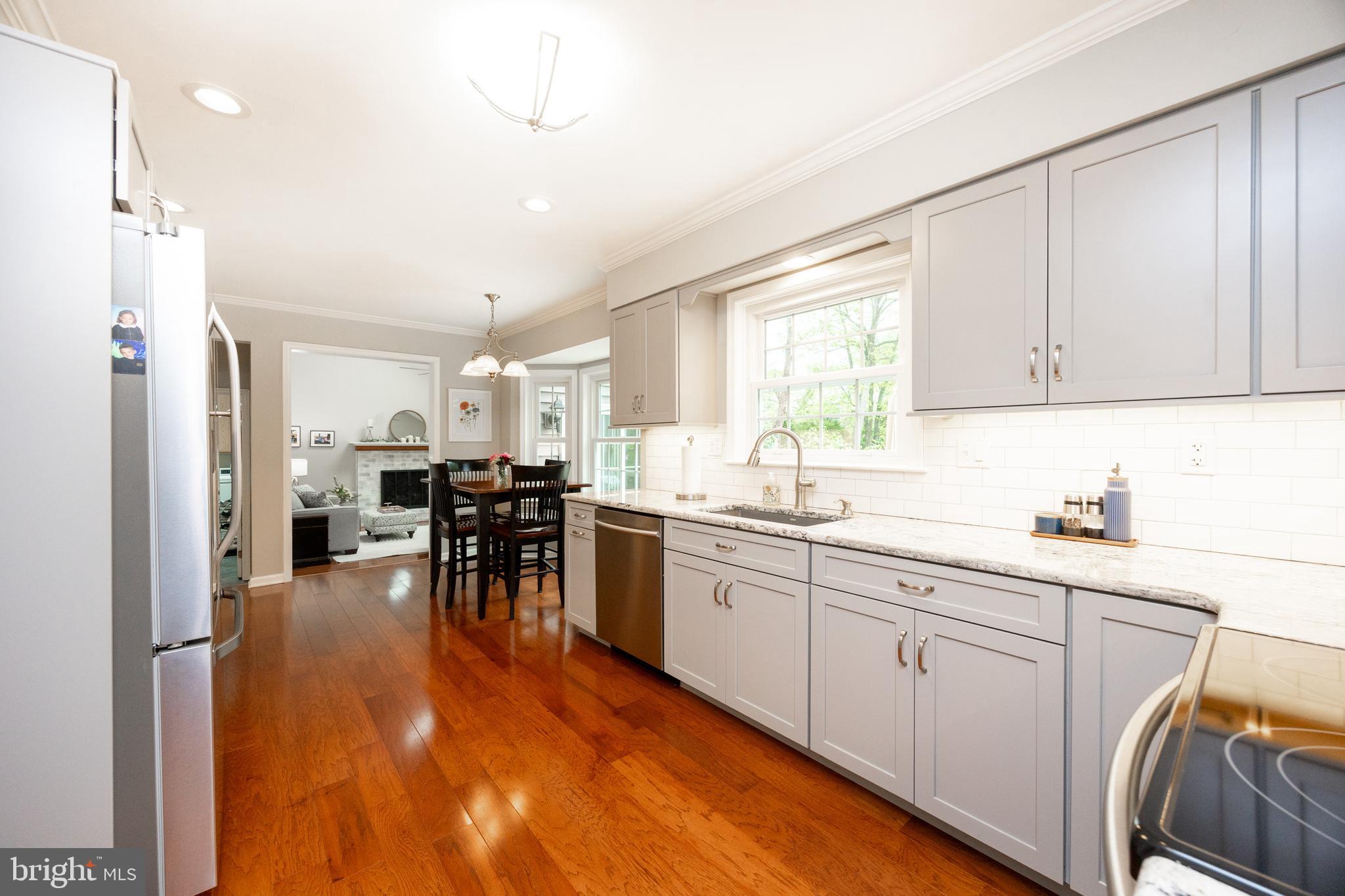 211 Ravenwood Road Exton, PA 19341 - Photo 32 of 44 Kitchen Window view to groomed backyard
