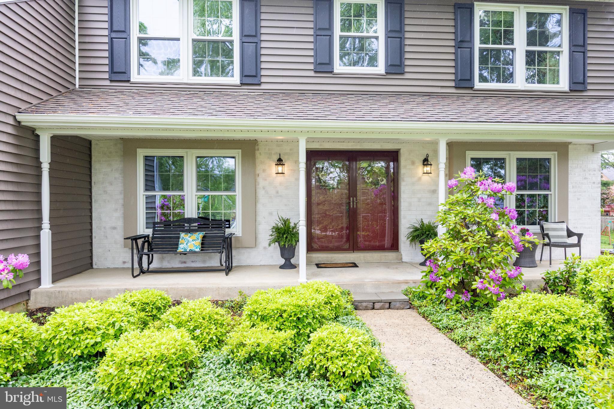 211 Ravenwood Road Exton, PA 19341 - Photo 4 of 44 Classic covered Front Porch entry, Rock and Relax