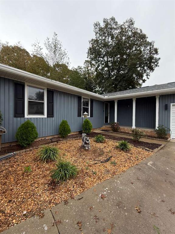 110 Foxfire Drive Warner Robins, GA 31093 - Photo 2 of 27 a view of a house with backyard and trees