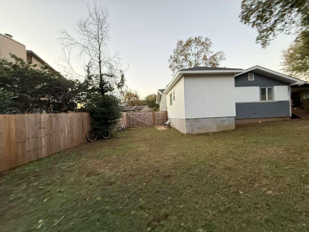 110 Foxfire Drive Warner Robins, GA 31093 - Photo 22 of 27 a white house that has a tree in front of it