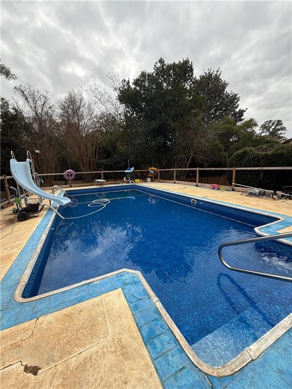 110 Foxfire Drive Warner Robins, GA 31093 - Photo 23 of 27 a view of a swimming pool with lounge chair