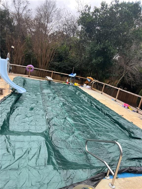 110 Foxfire Drive Warner Robins, GA 31093 - Photo 27 of 27 a view of a swimming pool with a yard