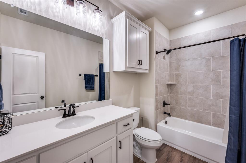 331 Osage Court Krum, TX 76249 - Photo 15 of 19 Full guest bathroom