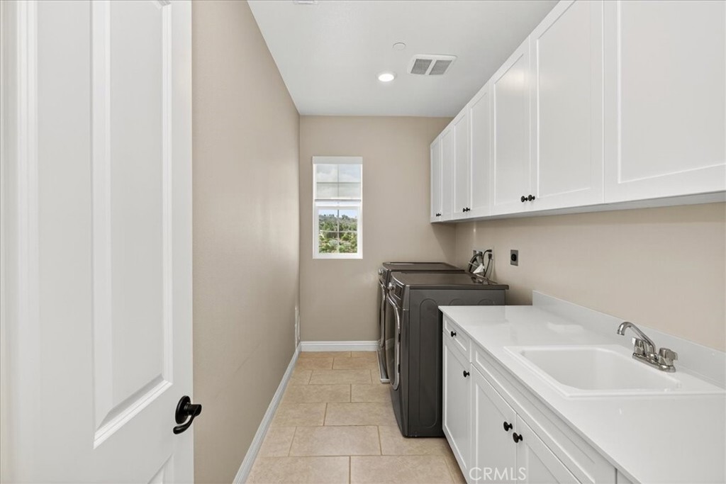 16069 Ranchview Court Riverside, CA 92504 - Photo 46 of 74 Laundry Room Upstairs