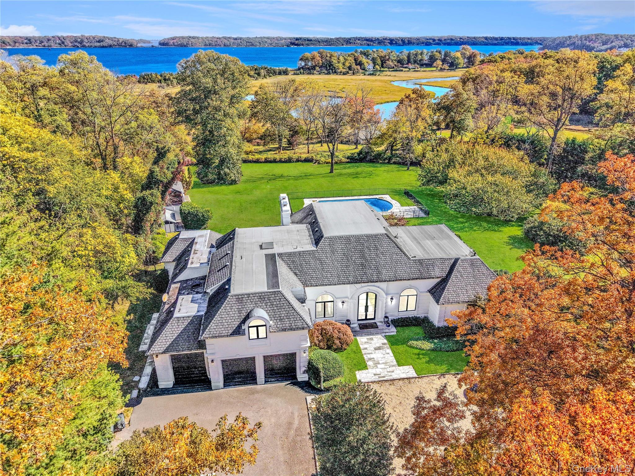 Aerial of 3.2 Acre Lush, waterview Home and Guest Cottage