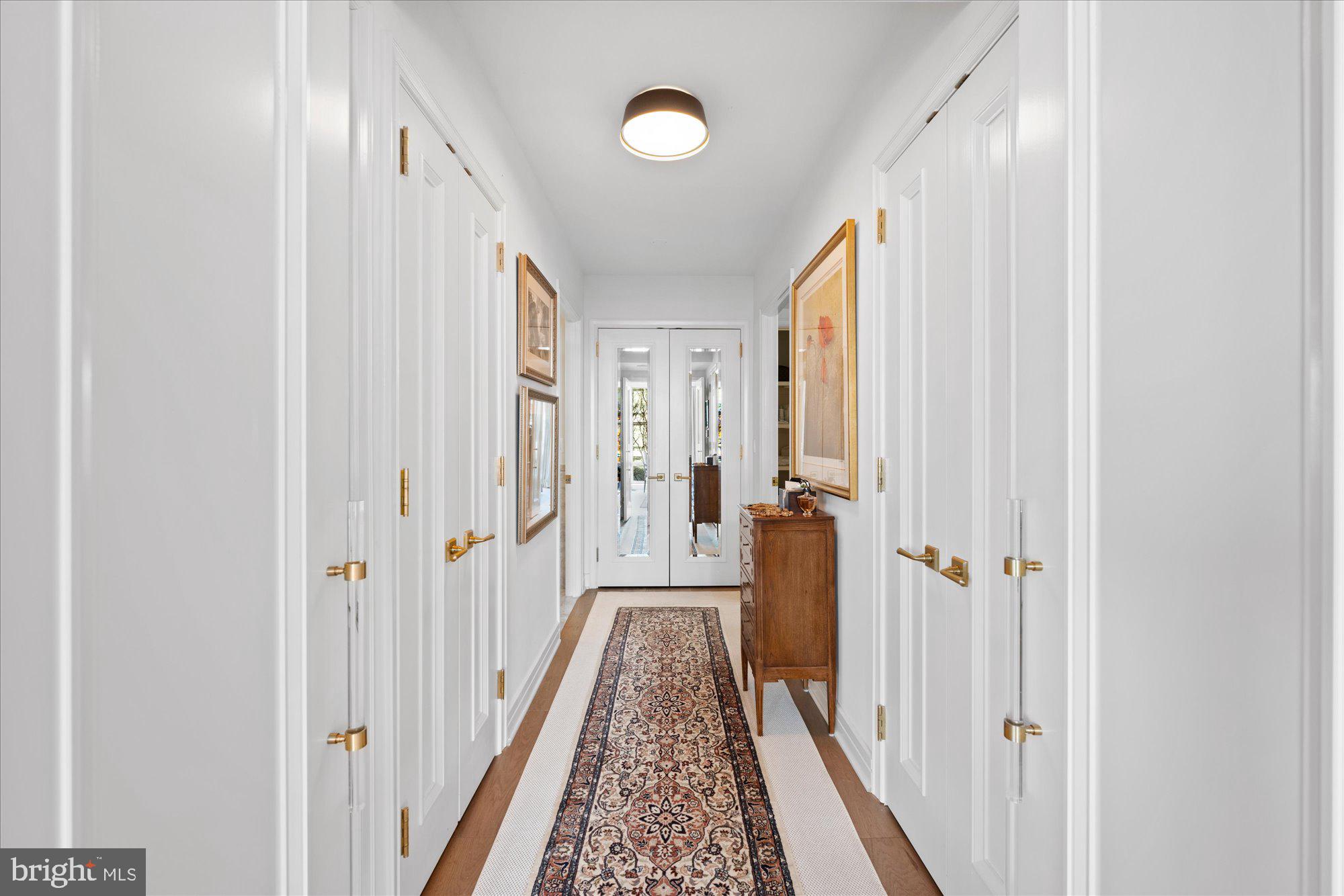 1155 23rd Street Northwest, Unit 7G Washington, DC 20037 - Photo 25 of 38 a view of a hallway with a livingroom and a hallway
