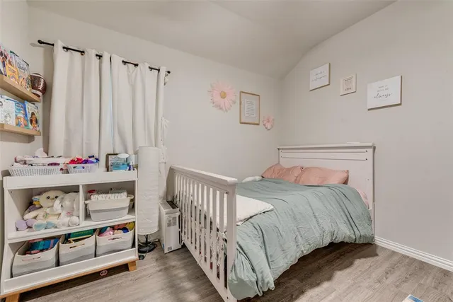 a bathroom with a double vanity sink and mirror