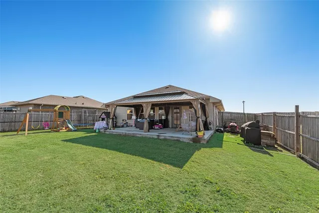 a view of garden with grass