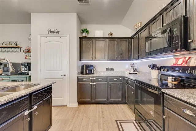 a view of a dining room with furniture