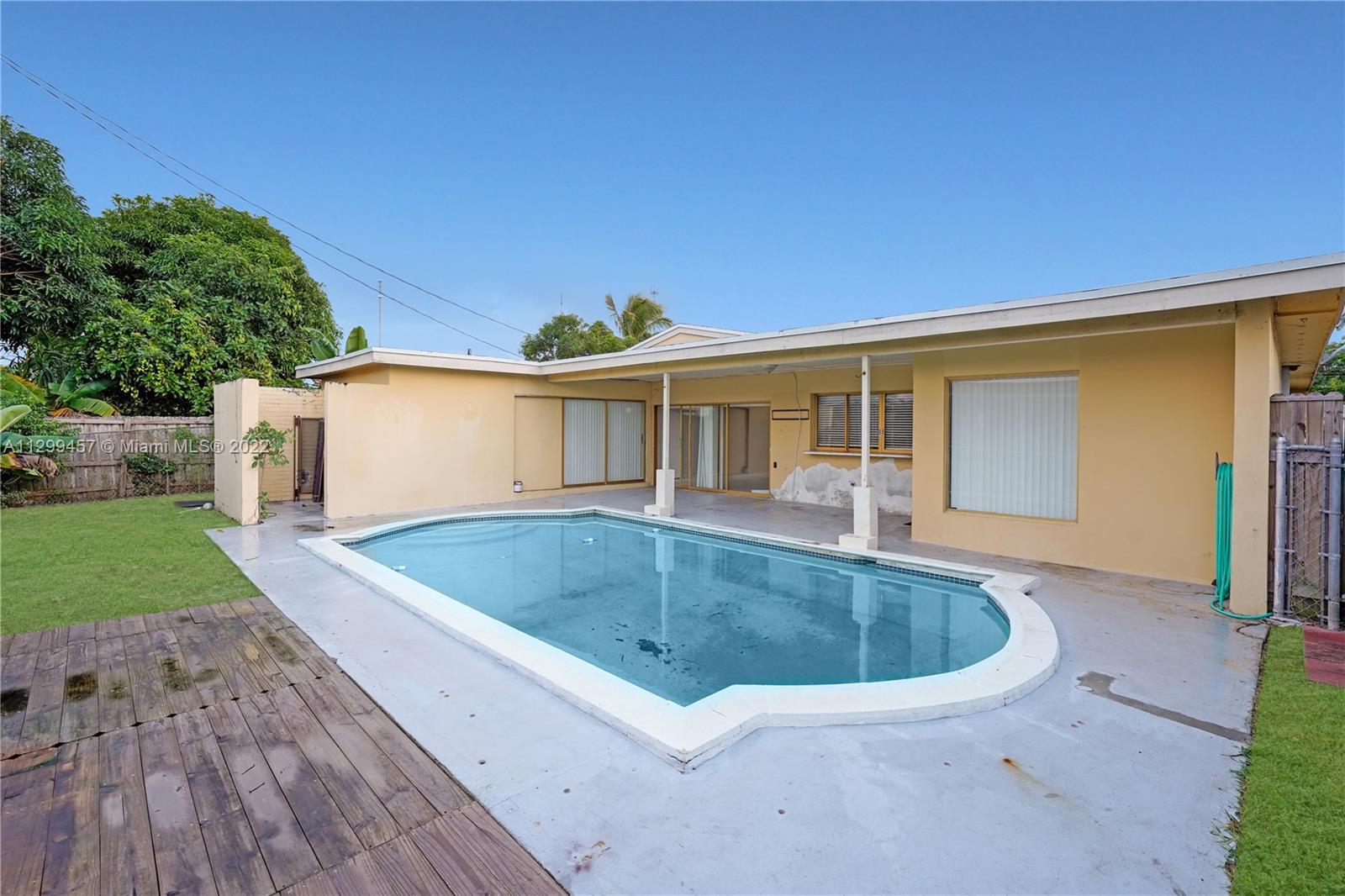 6745 Pansy Drive Miramar, FL 33023 - Photo 31 of 33 a view of outdoor space yard and swimming pool