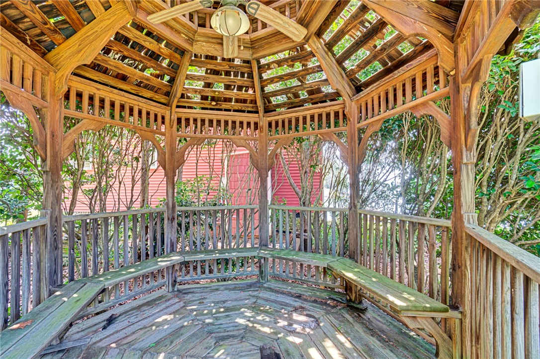 225 Nicholson Cove Road Seneca, SC 29672 - Photo 7 of 22 An inviting wooden gazebo provides a perfect spot for outdoor relaxation and enjoyment.