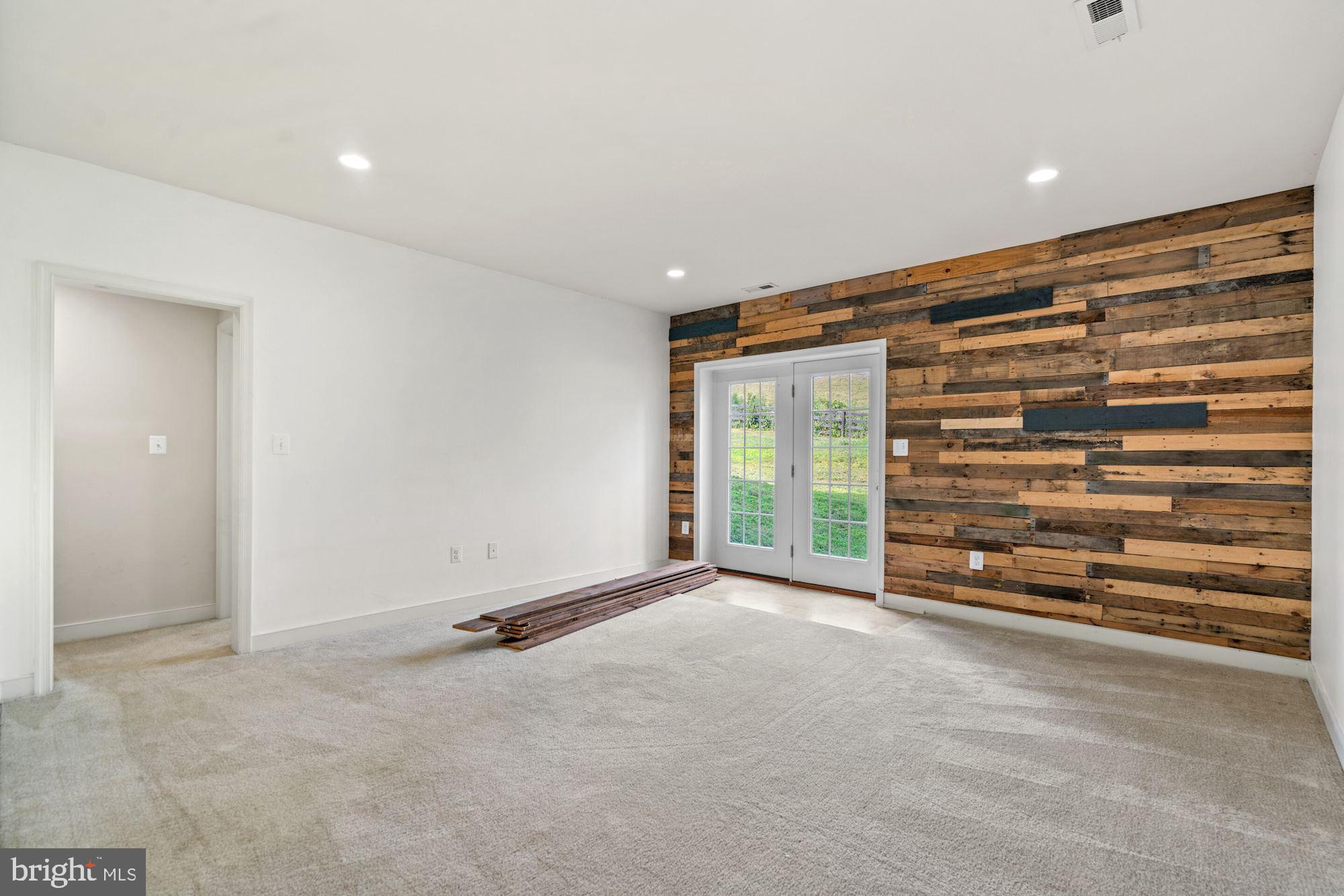 3276 Rokeby Road Delaplane, VA 20144 - Photo 43 of 55 Rec Room with reclaimed wood accent wall