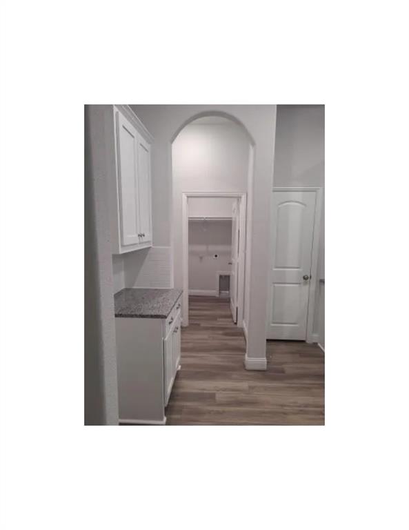 337 Eagle Ridge Road Forney, TX 75126 - Photo 4 of 16 a open hall with wooden floor