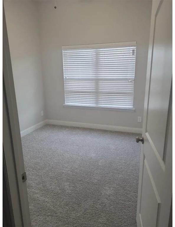 337 Eagle Ridge Road Forney, TX 75126 - Photo 5 of 16 a view of room that has a door