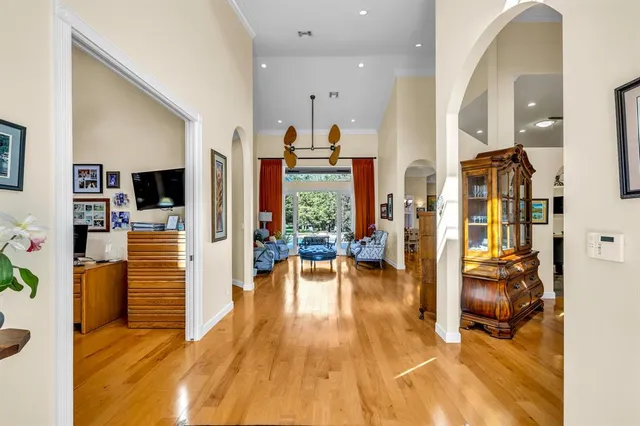 a view of a living room and entry way
