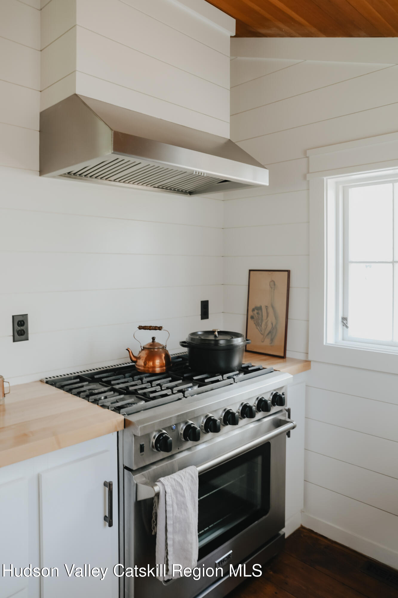 433 Rapp Road Valatie, NY 12184 - Photo 13 of 61 a stove top oven sitting inside of a kitchen