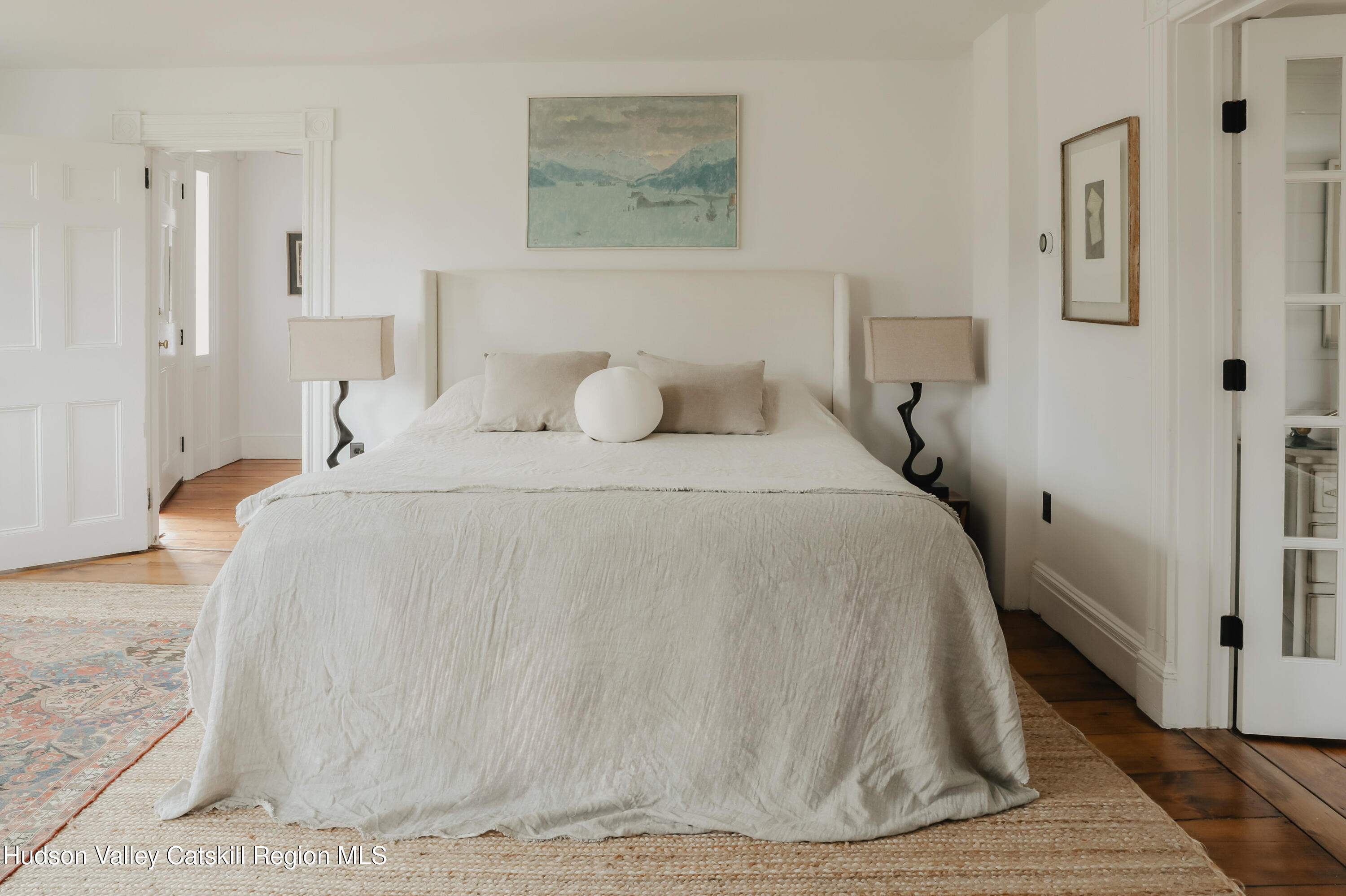 433 Rapp Road Valatie, NY 12184 - Photo 22 of 61 a bedroom with a bed and a wooden floor