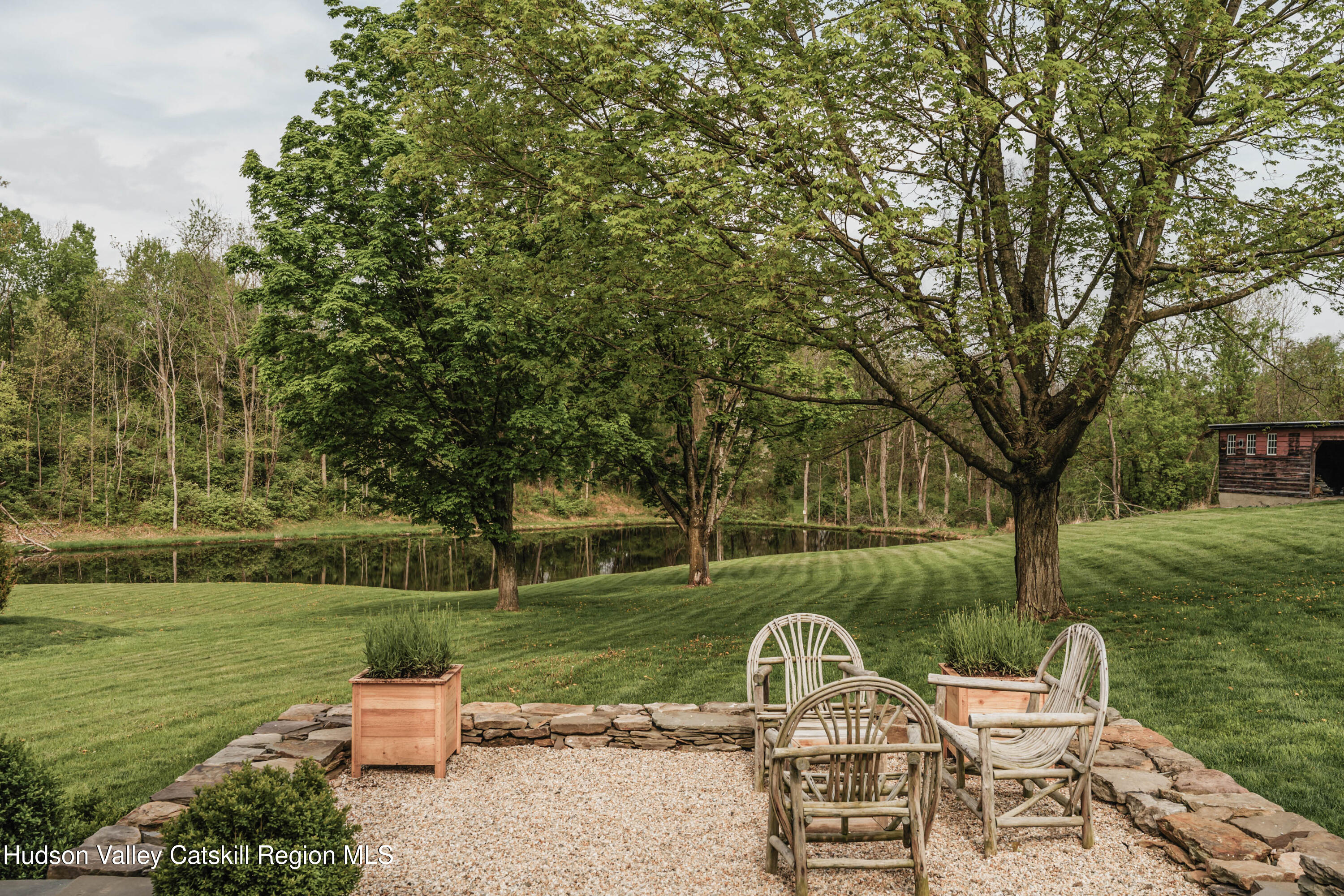 433 Rapp Road Valatie, NY 12184 - Photo 26 of 61 a view of a table and chairs in the garden