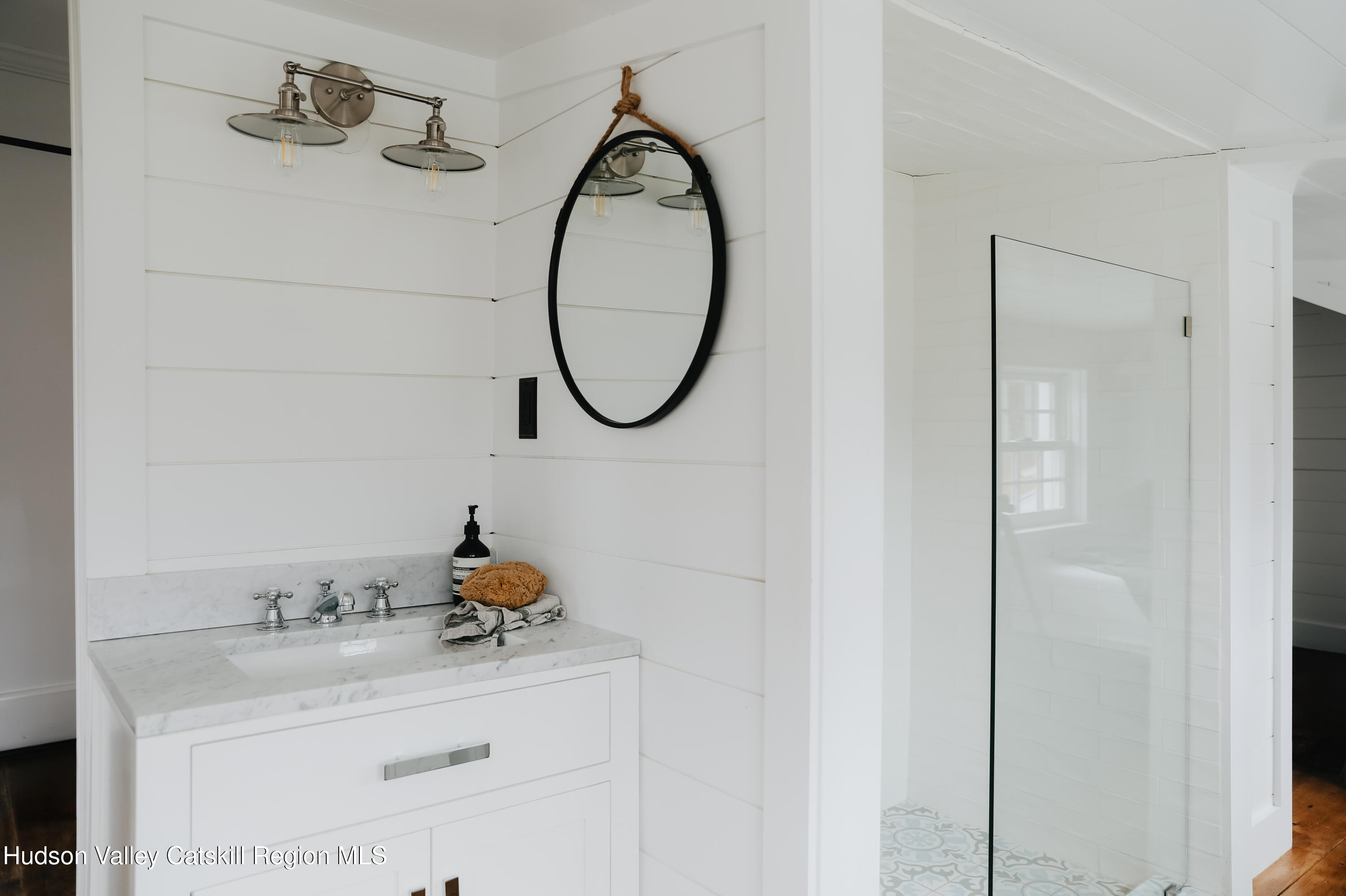433 Rapp Road Valatie, NY 12184 - Photo 39 of 61 a bathroom with a sink and a mirror