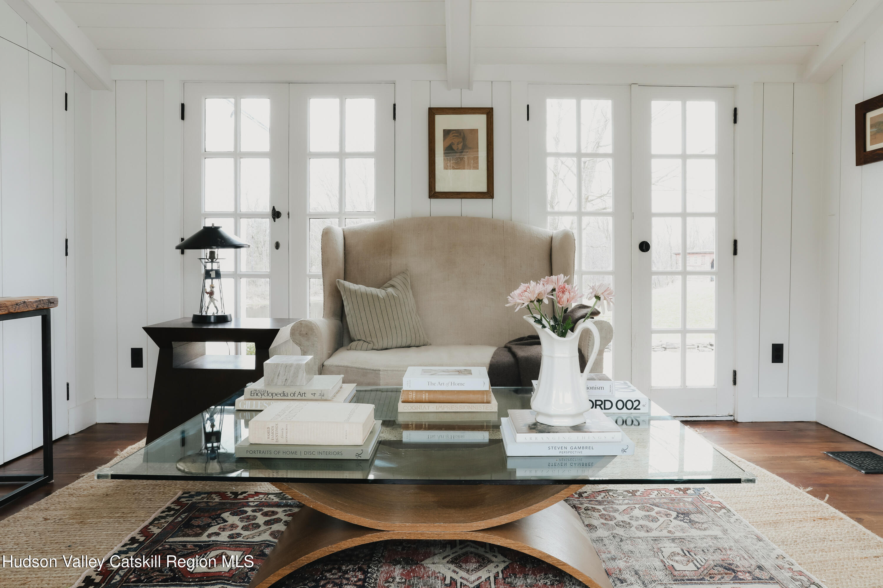 433 Rapp Road Valatie, NY 12184 - Photo 48 of 61 a living room with furniture and wooden floor