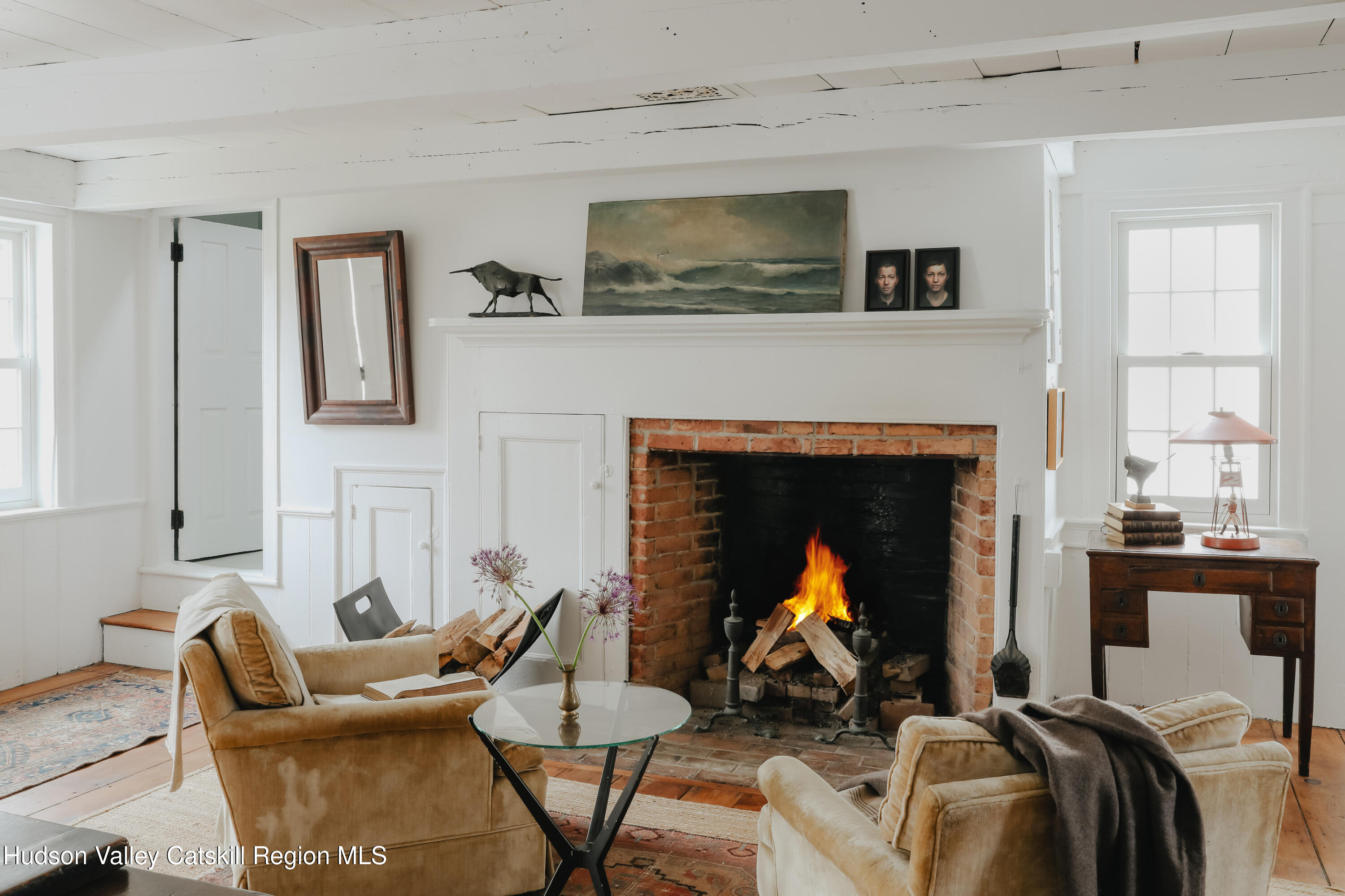 433 Rapp Road Valatie, NY 12184 - Photo 8 of 61 a living room with furniture and a fireplace
