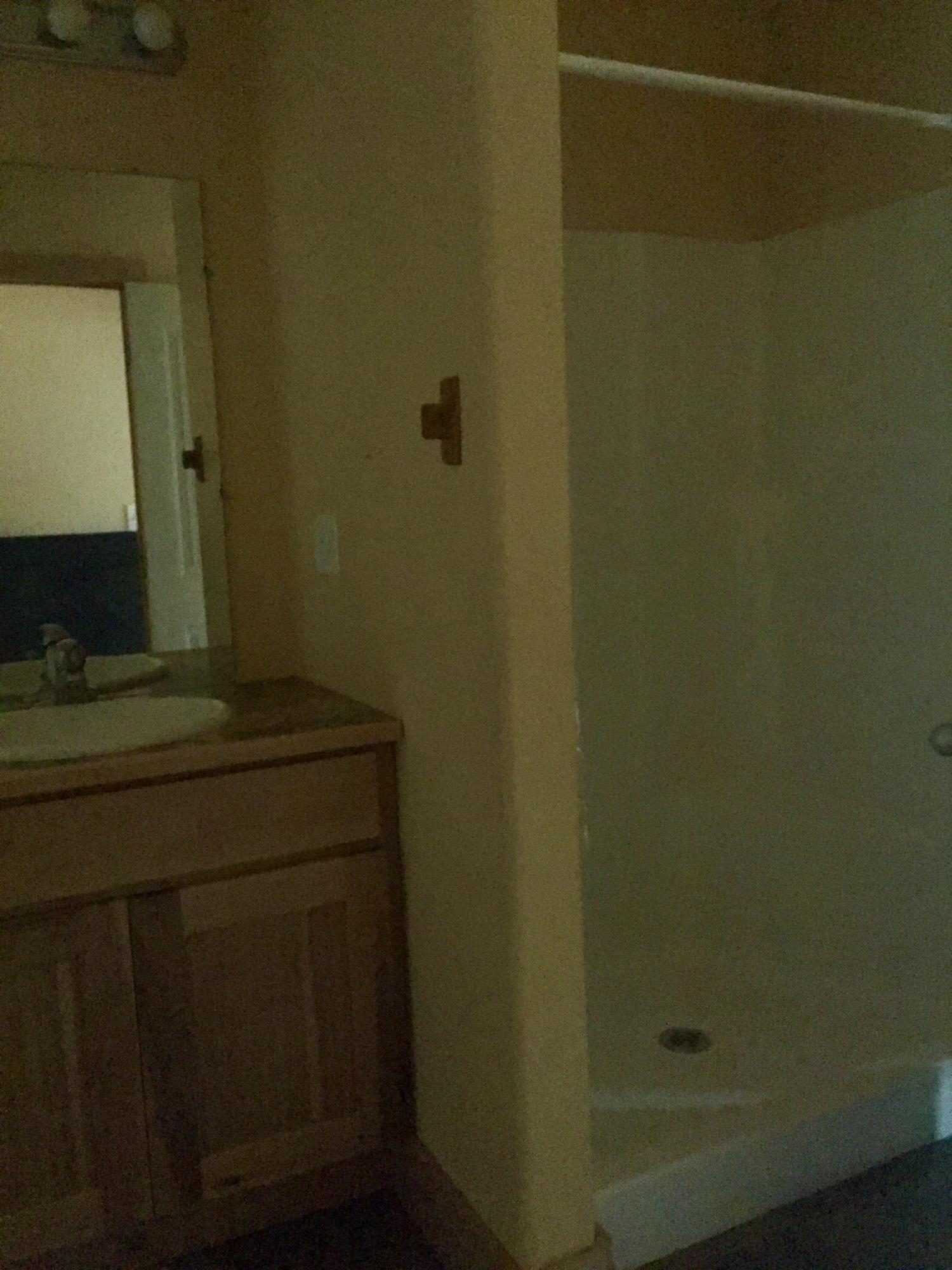 5960 Old Hickory Road Crestview, FL 32539 - Photo 14 of 43 a bathroom with a sink and a mirror