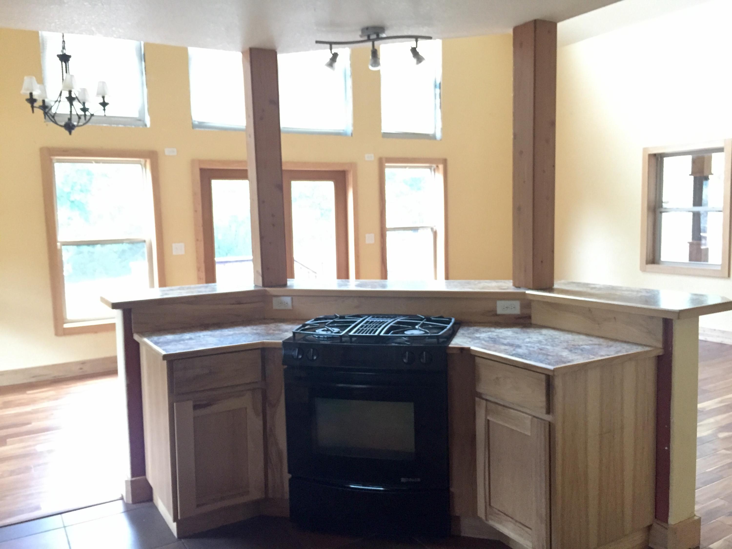 5960 Old Hickory Road Crestview, FL 32539 - Photo 3 of 43 a kitchen with a stove and a sink