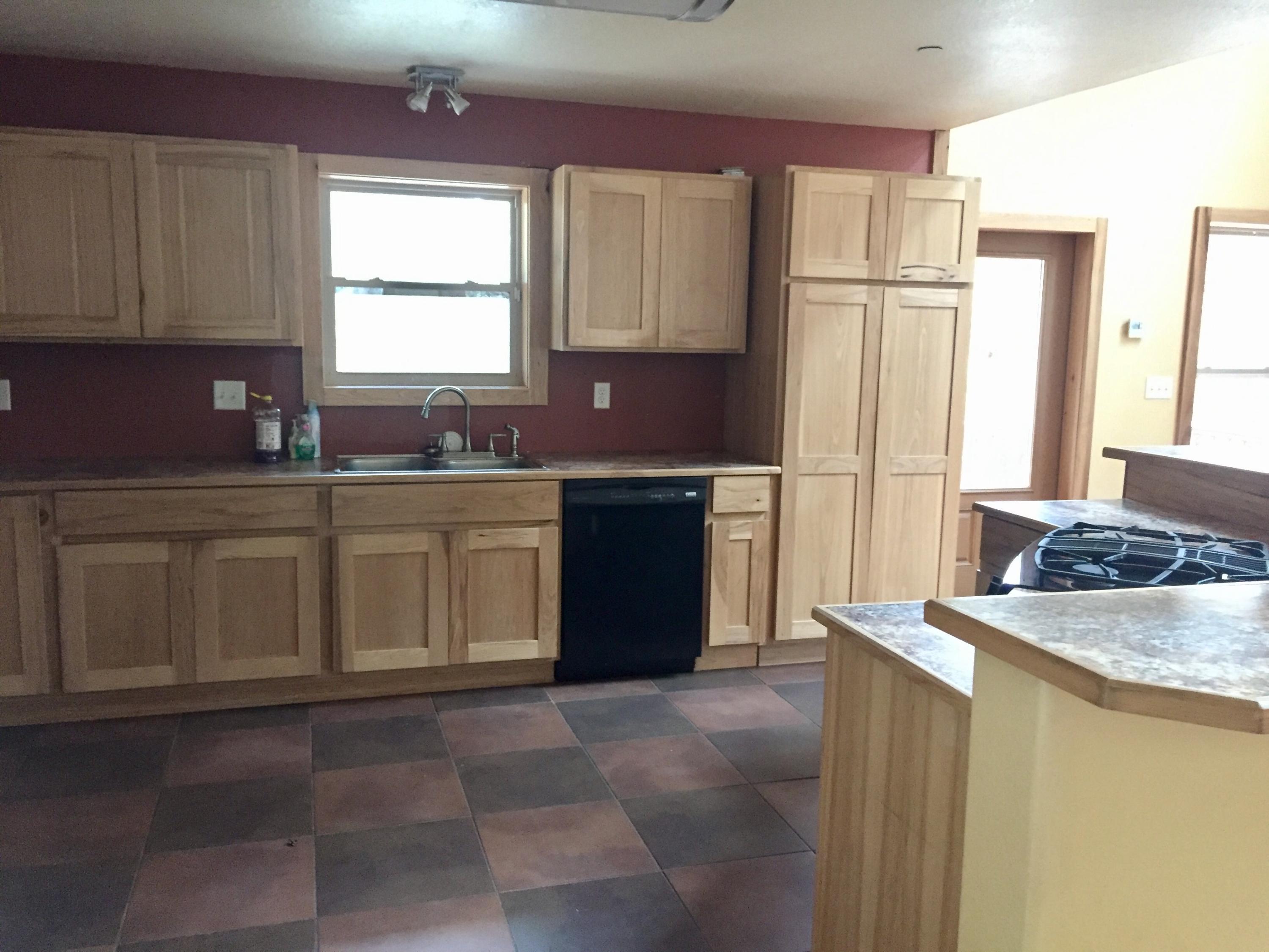 5960 Old Hickory Road Crestview, FL 32539 - Photo 9 of 43 a kitchen with a sink stove and cabinets