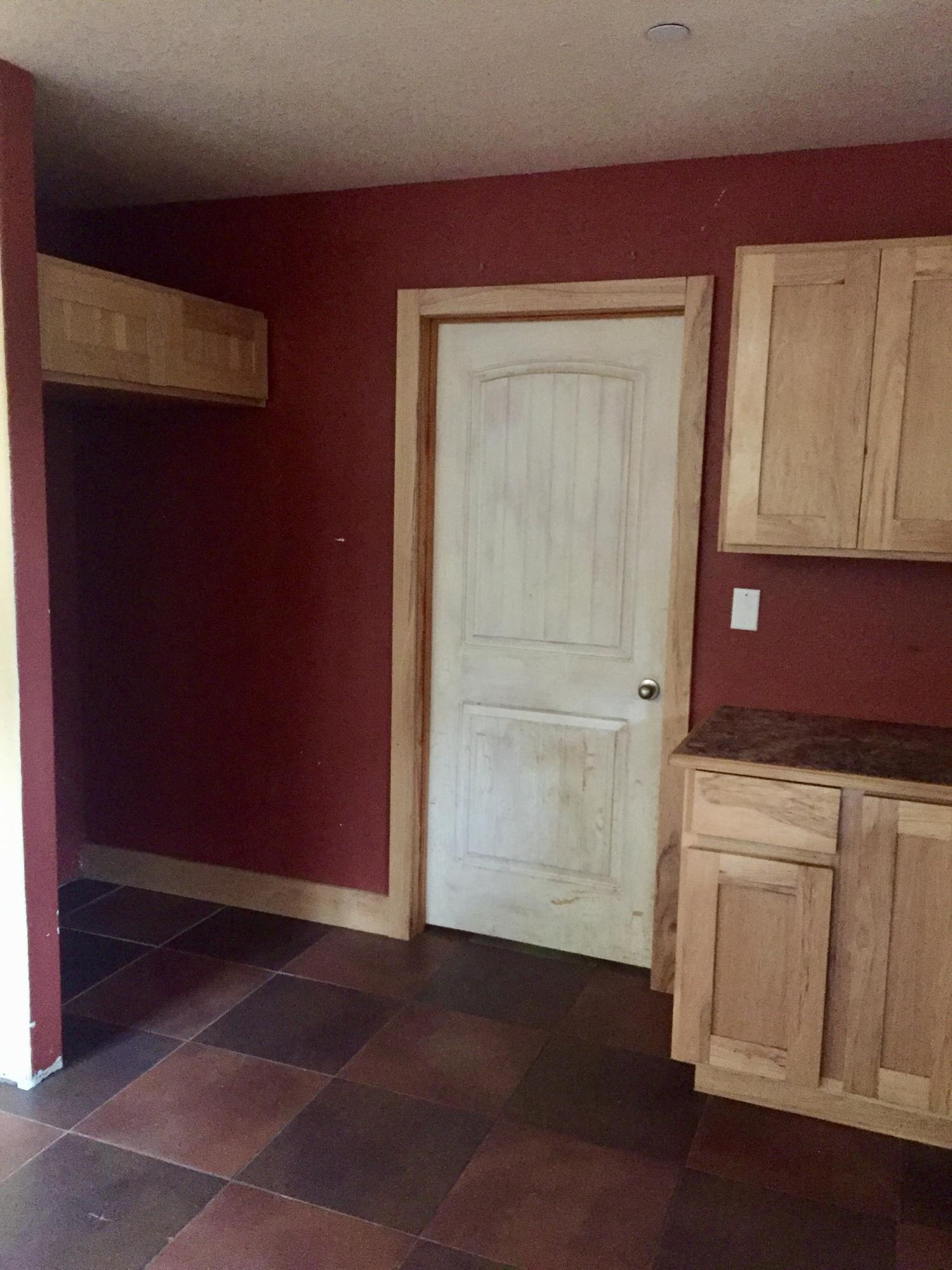 5960 Old Hickory Road Crestview, FL 32539 - Photo 10 of 43 a area with wooden floor and cabinet