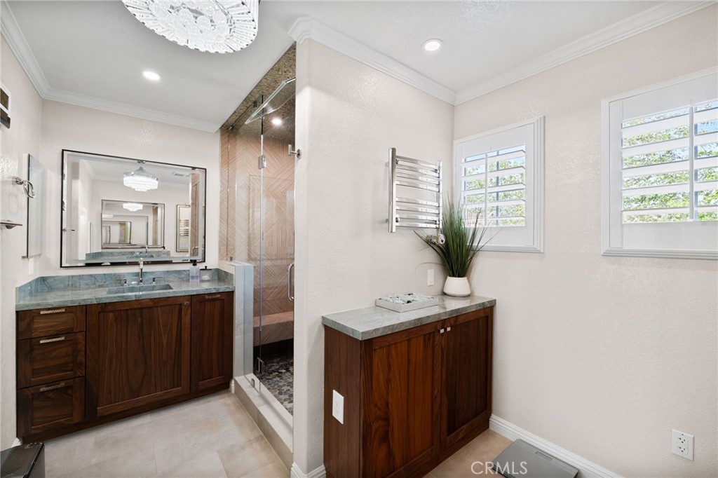12759 East Rancho Estates Place Rancho Cucamonga, CA 91739 - Photo 38 of 69 a bathroom with a double vanity sink mirror and