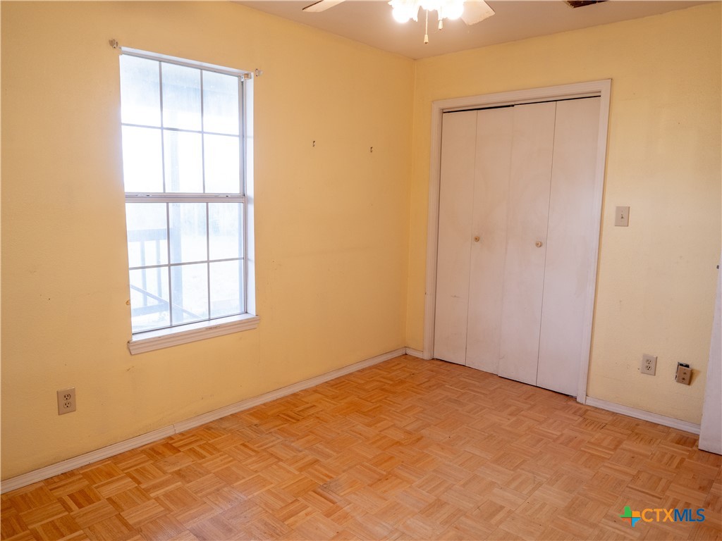 6611 Tigre Road Beeville, TX 78102 - Photo 18 of 31 an empty room with a window
