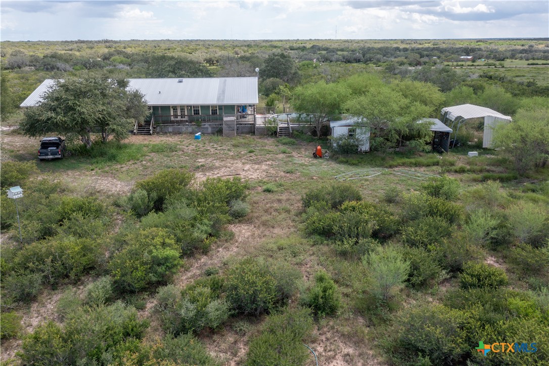 6611 Tigre Road Beeville, TX 78102 - Photo 29 of 31 an aerial view of a house with mountain view