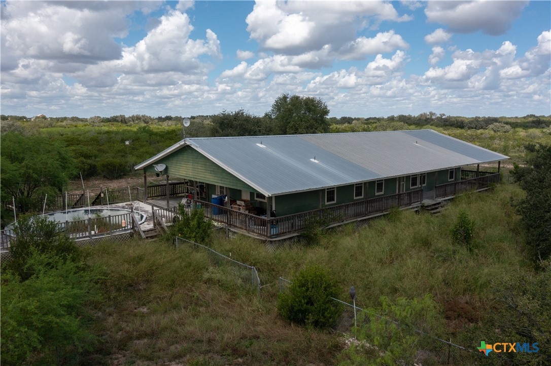 6611 Tigre Road Beeville, TX 78102 - Photo 31 of 31 a aerial view of a house with pool