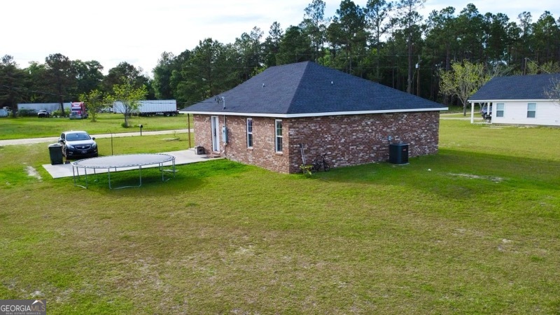 75 Gov Seay Road Collins, GA 30421 - Photo 2 of 7 a view of a house with a yard