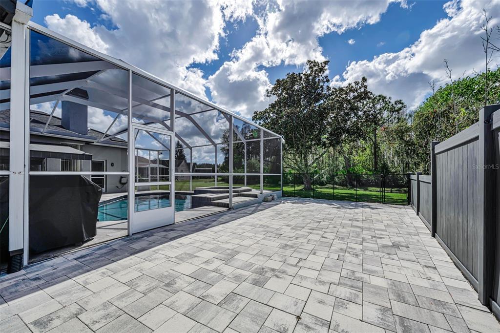 1151 Arlinbrook Drive Trinity, FL 34655 - Photo 19 of 69 a view of a house with a backyard