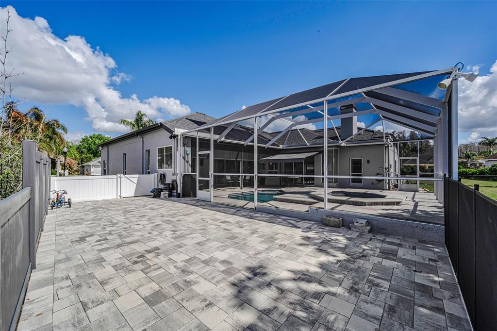 1151 Arlinbrook Drive Trinity, FL 34655 - Photo 20 of 69 a view of a house with a patio
