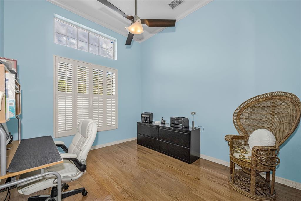 1151 Arlinbrook Drive Trinity, FL 34655 - Photo 48 of 69 a workspace with furniture and a window