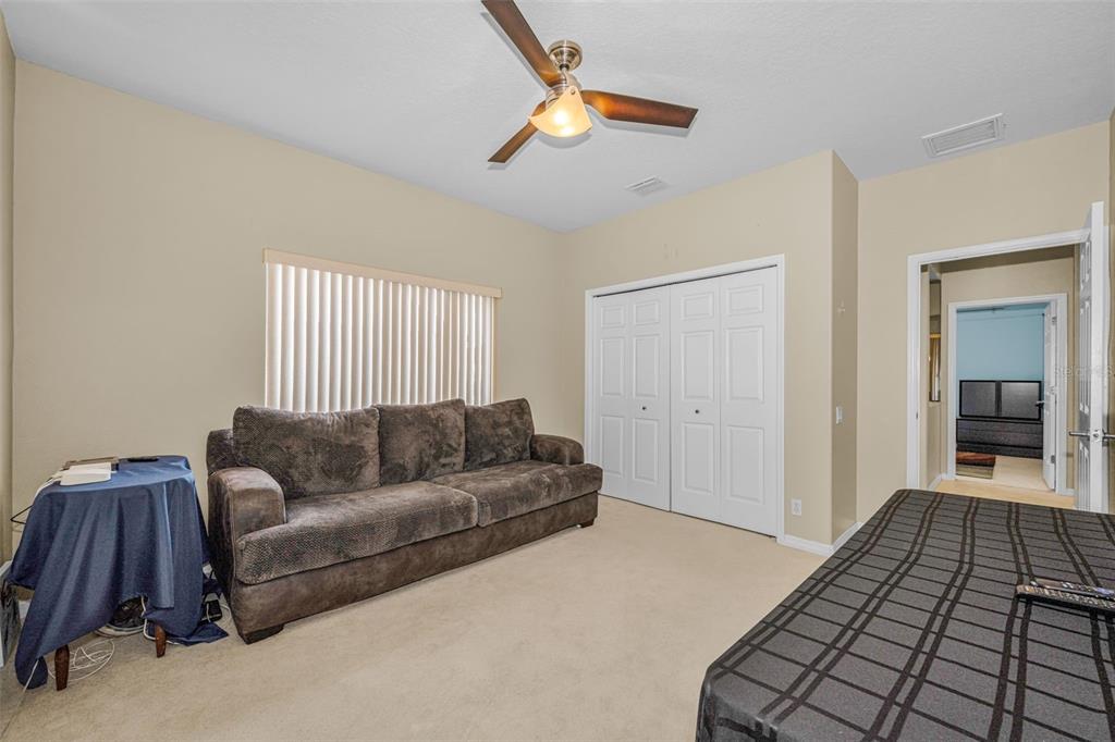 1151 Arlinbrook Drive Trinity, FL 34655 - Photo 55 of 69 a living room with furniture and a walk in closet