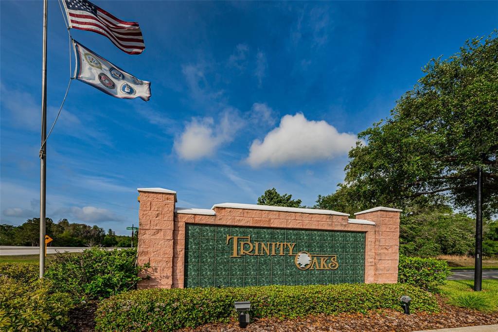 1151 Arlinbrook Drive Trinity, FL 34655 - Photo 57 of 69 a sign on the side of a building